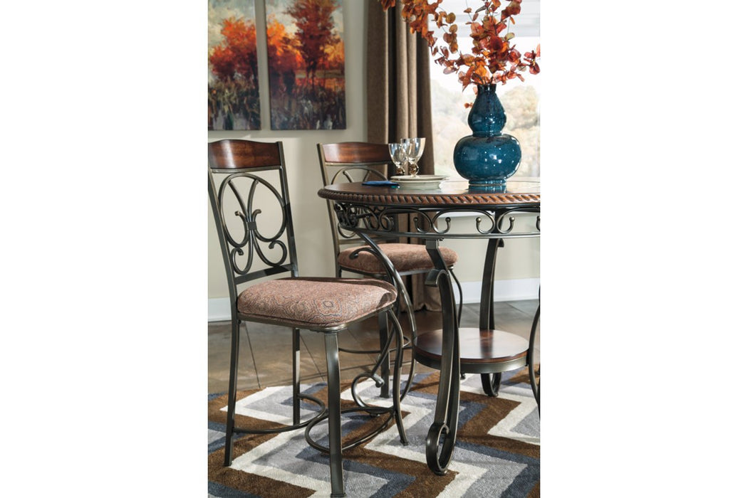 Glambrey counter height dining table and 4 outlet barstools